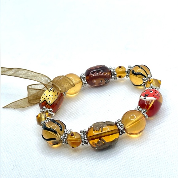 Neutral Warm Toned Glass Beads Bracelet With Hand Painted Animal Design - Picture 4 of 4